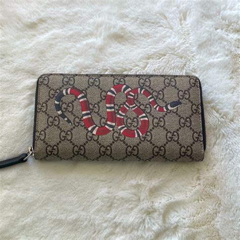 gucci gg supreme zip-around wallet brown|gucci kingsnake men's wallet.